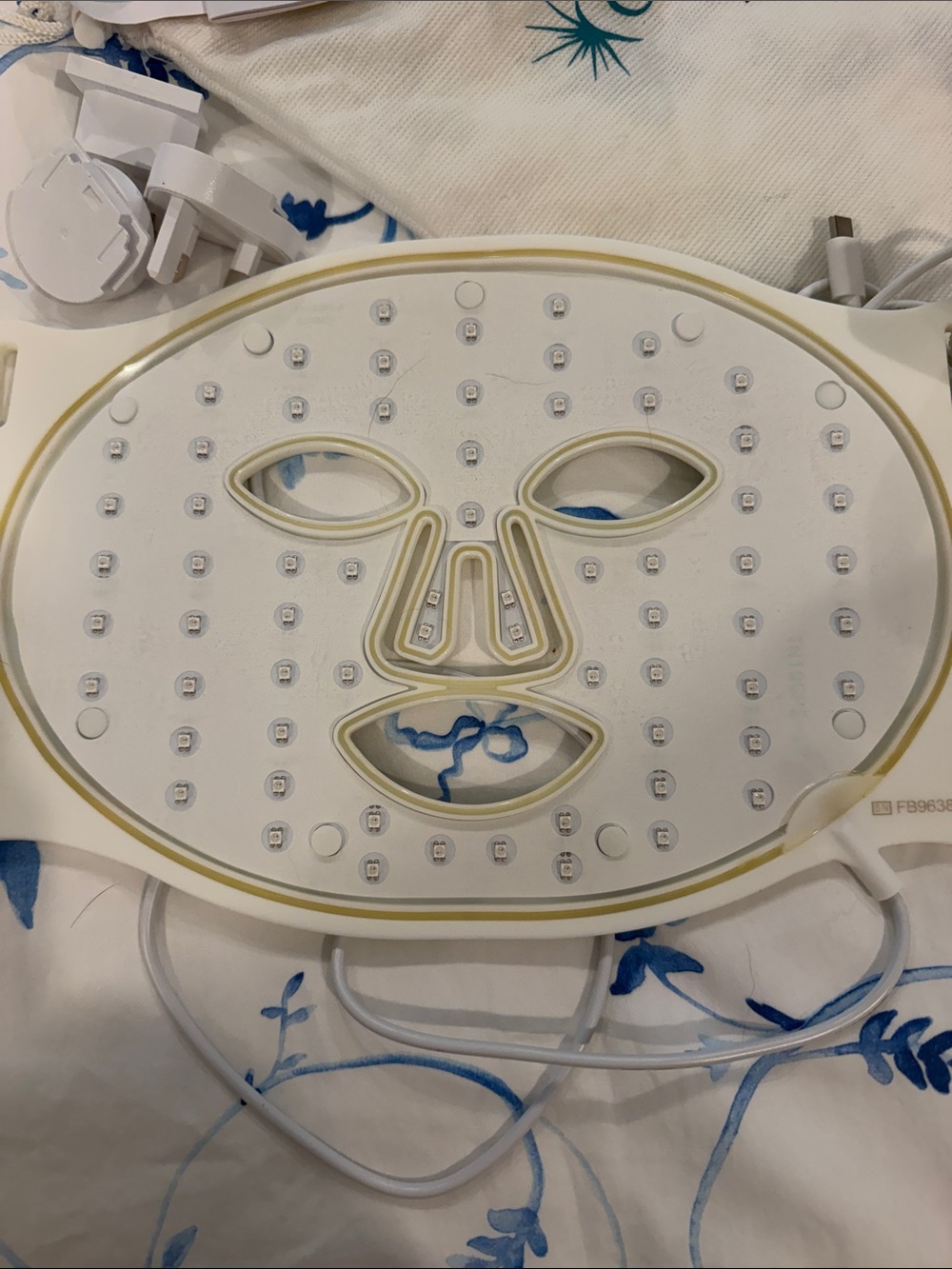 Omnilux Contour Face LED Therapy Mask - Cream with Teal Leaf Pattern - Picture 2 of 5